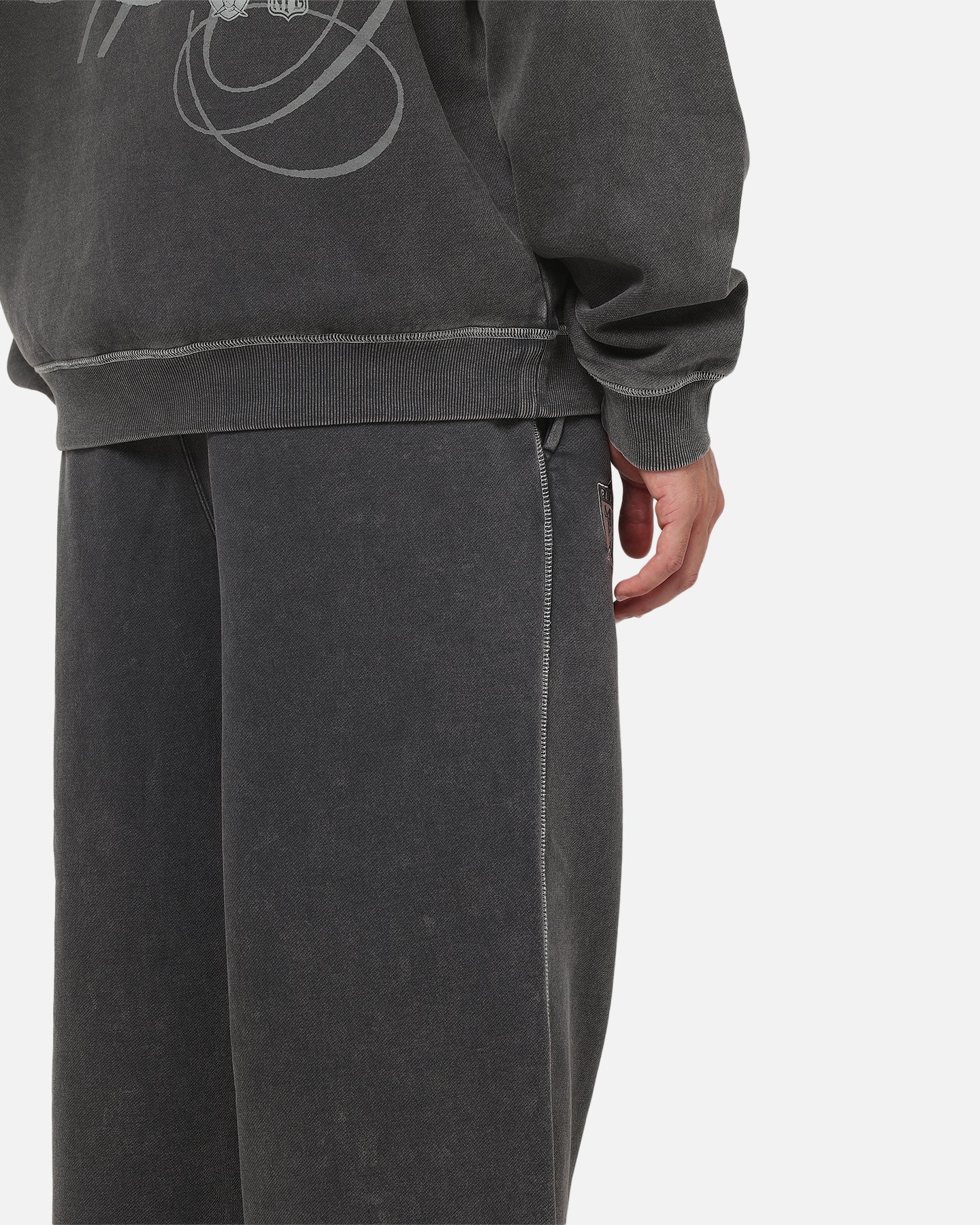Mitchell & Ness Las Vegas Raiders Star Script Relaxed Track Pants Washed Black